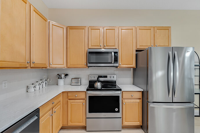 an albuquerque kitchen with cabinets that need to be painted.