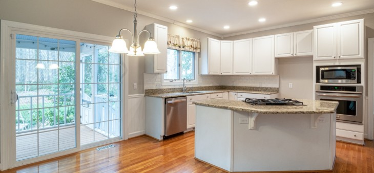 kitchen with white, painted cabinets