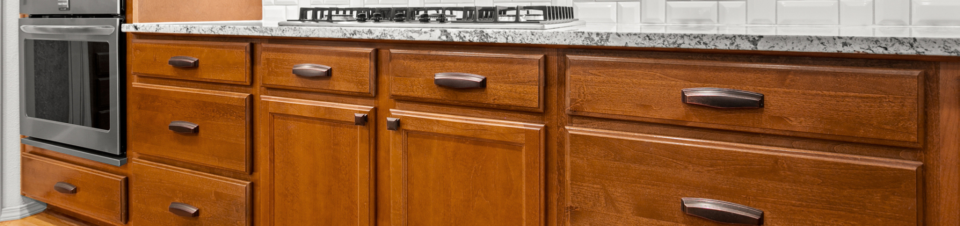 Photo of kitchen with old cabinets before refinishing