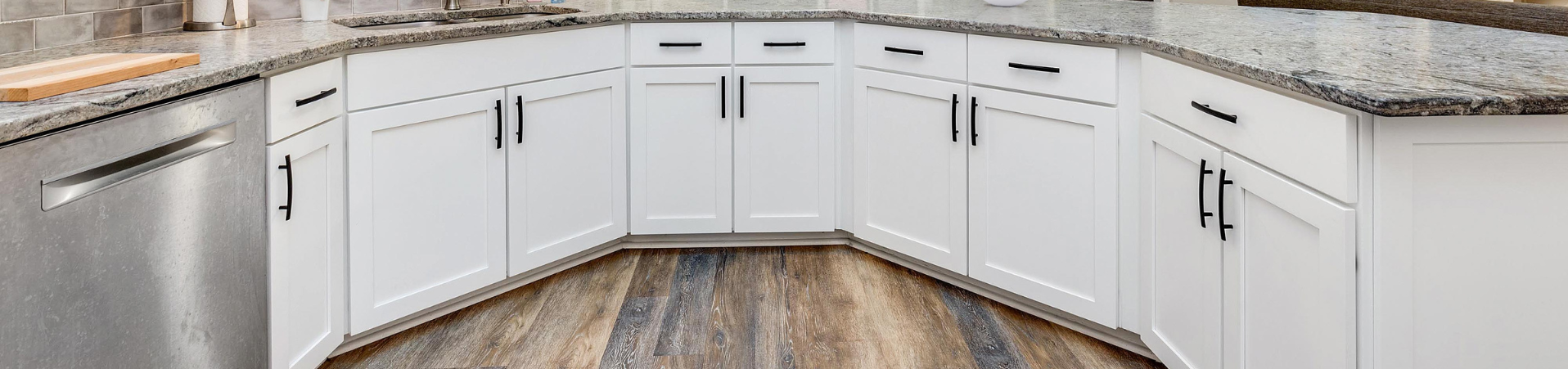 Photo of kitchen with blue and white refinished cabinets