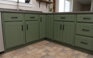 Green kitchen cabinet reference photo