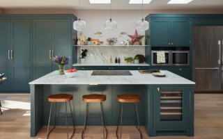 Green kitchen island with built in appliances