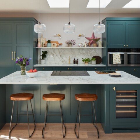 Green kitchen island with built in appliances