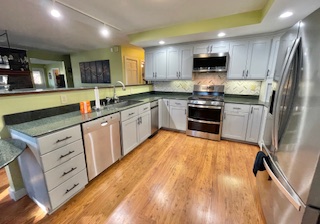 refinished cabinets in a grey color