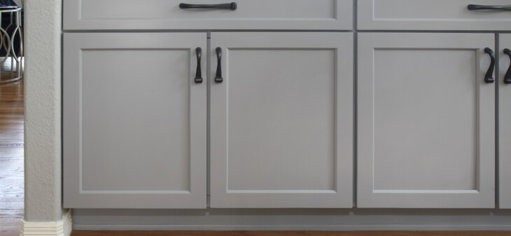 Grey cabinets with black bar hardware