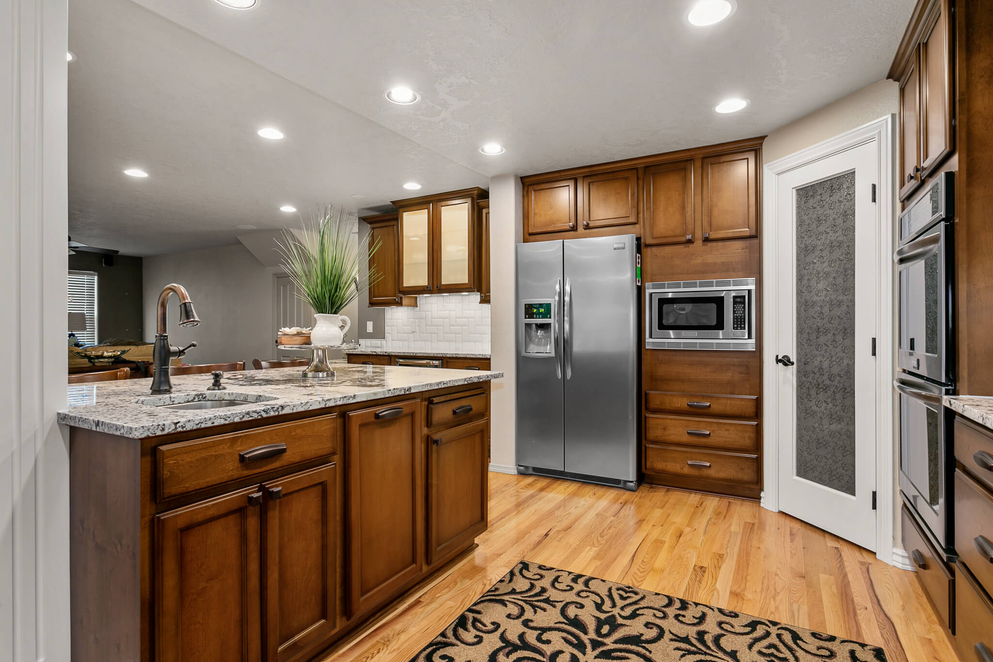 new kitchen after cabinet refinishing in Columbia